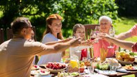 leisure-holidays-people-concept-happy-family-having-festive-dinner-summer-garden-party-celebrating.jpg