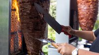 close-up-mexican-taquero-cutting-pastor-meat-center-mexico-city.jpg